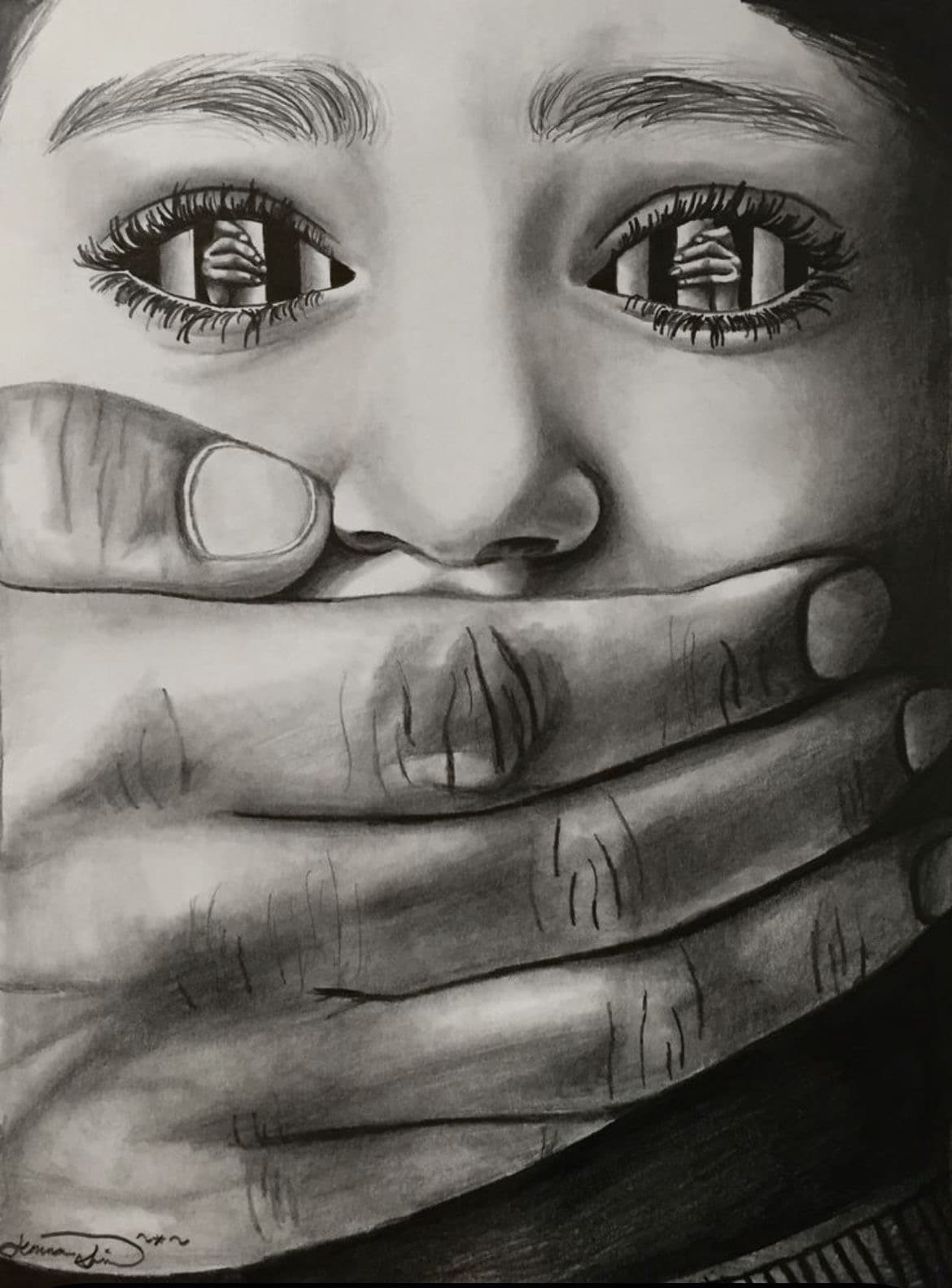 A picture of a child with an adults hand over their mouth